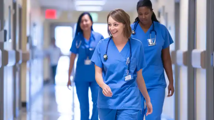 A nurse stands in a rural health care facility.