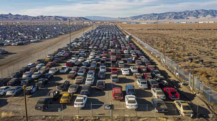 New cars parked in desert lot